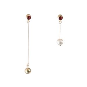 Pair of Asymmetric earrings.